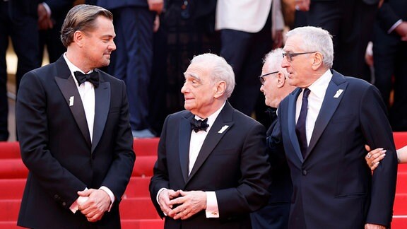 Leonardo DiCaprio, Martin Scorsese und Robert De Niro posieren auf dem roten Teppich bei den Filmfestspielen in Cannes.