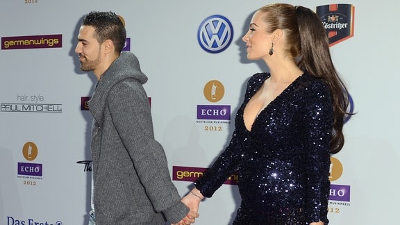 German musician Bushido and partner Anna-Maria Lagerblom arrive for the 2012 Echo Music Awards in Berlin, Germany, 22 March 2012. The Echo Music Award is presented in 27 categories.