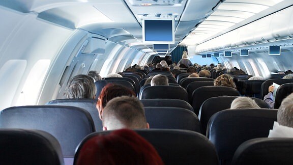 Flugzeugkabine mit Passagieren