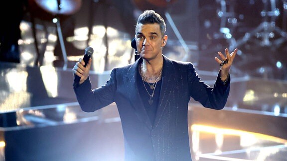 Sänger Robbie Williams während der ZDF - Fernsehshow Wetten , dass...?