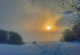 Sonne und Schneetreiben