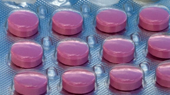 Pinkfarbene Tabletten